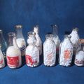 Lot 168 - Grouping of 14 Vintage Printed Glass Dairy Milk Bottles Including Brownell Bros., Price's Farms Dairy, Talcott View Farms, Cashin's, and Great Oak Farm