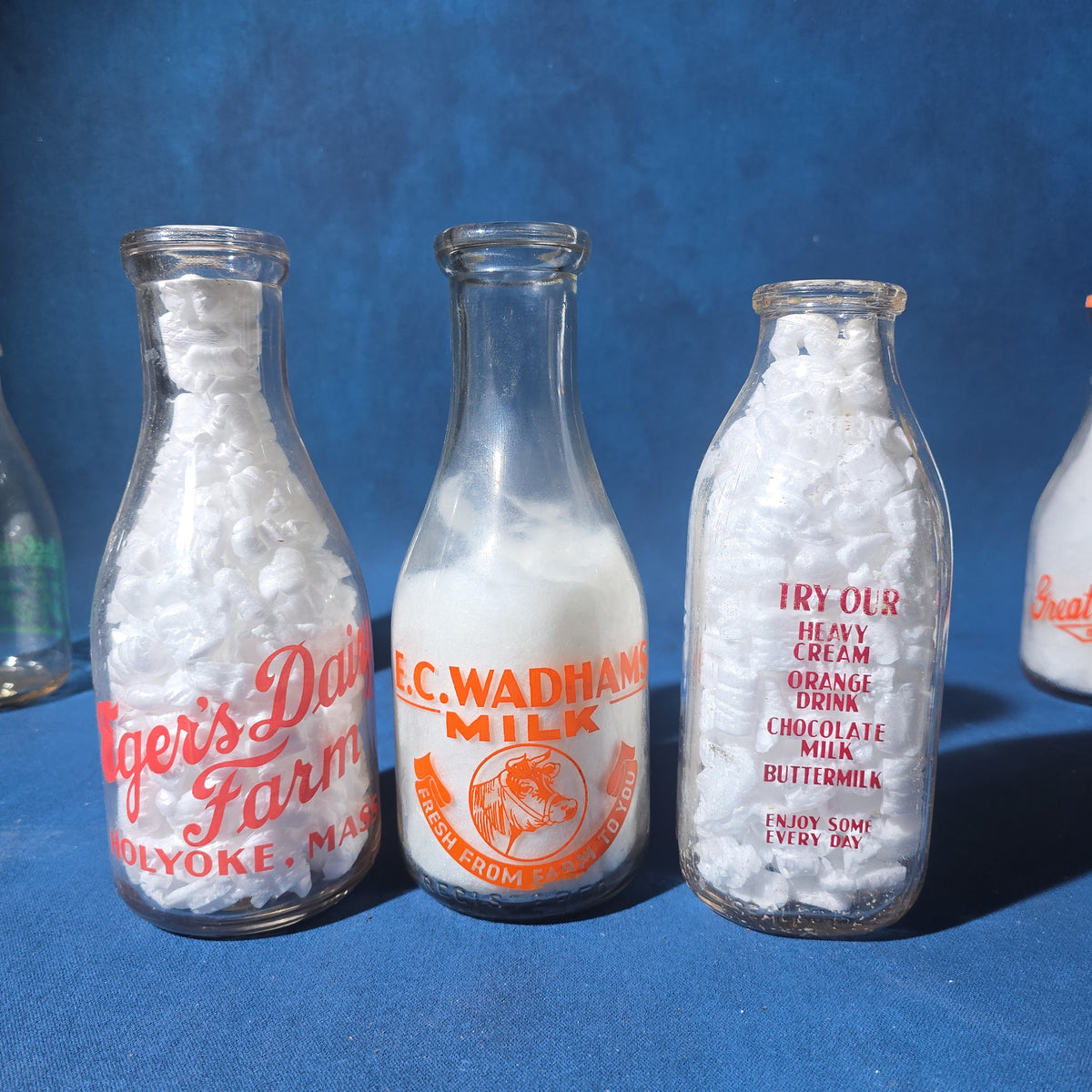 Grouping of 14 Vintage Printed Glass Dairy Milk Bottles including Brownell Bros., Price's Farms Dairy, Talcott View Farms, Cashin's, and Great Oak Farm