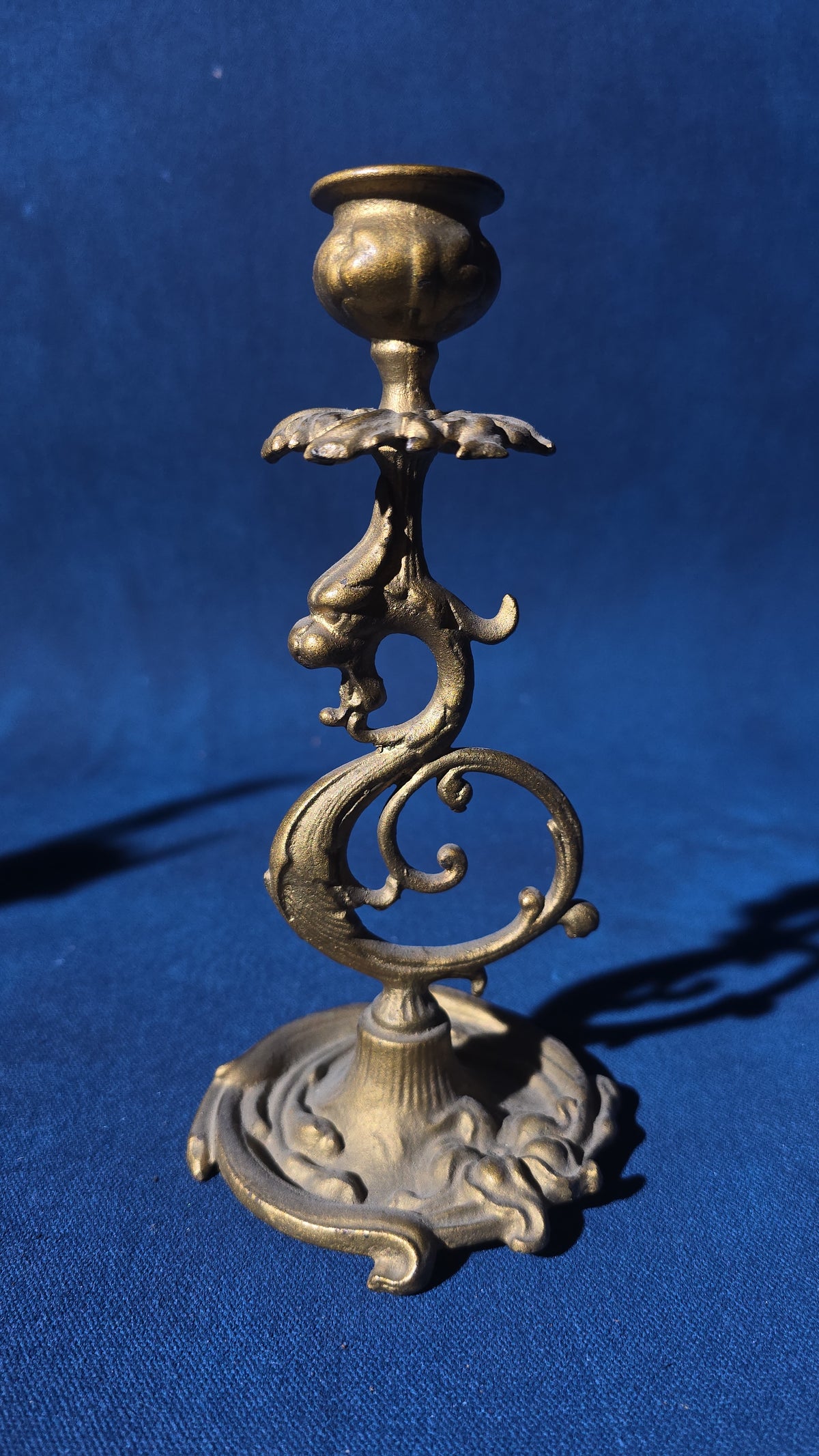 Grouping of Four Antique and Vintage Brass Candleholders including Crane on Turtle Figure, Three-Arm Candelabra, and Pair of Candlesticks