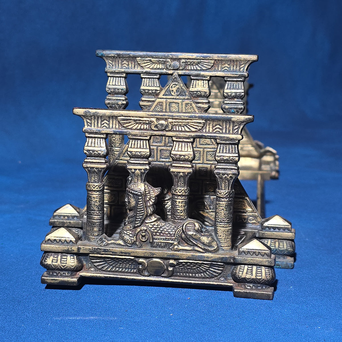 Antique Egyptian Revival Brass Expandable Book Rack