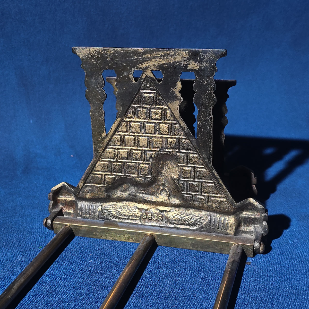 Antique Egyptian Revival Brass Expandable Book Rack