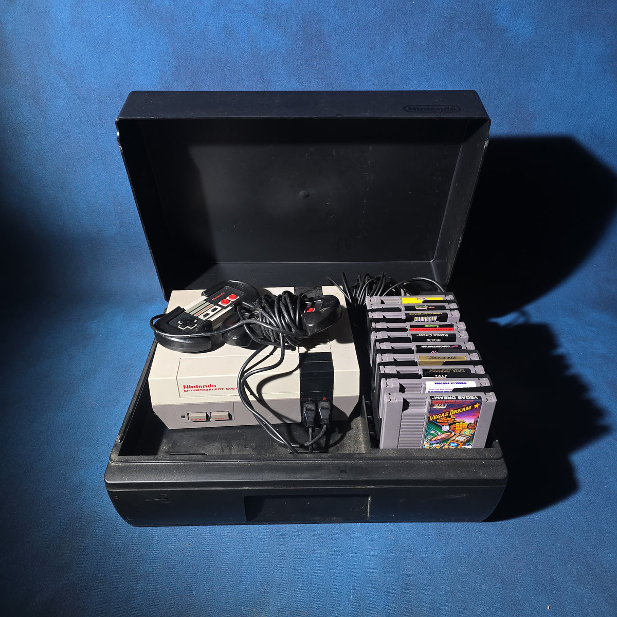 Vintage Nintendo Entertainment System NES-001 Console with Two Controllers, 15 Game Cartridges, NES Cleaning Kit, and Carrying Case
