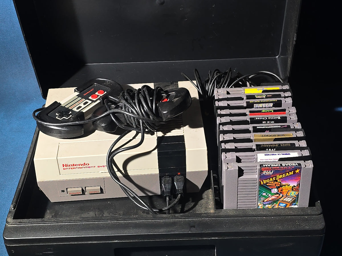 Vintage Nintendo Entertainment System NES-001 Console with Two Controllers, 15 Game Cartridges, NES Cleaning Kit, and Carrying Case