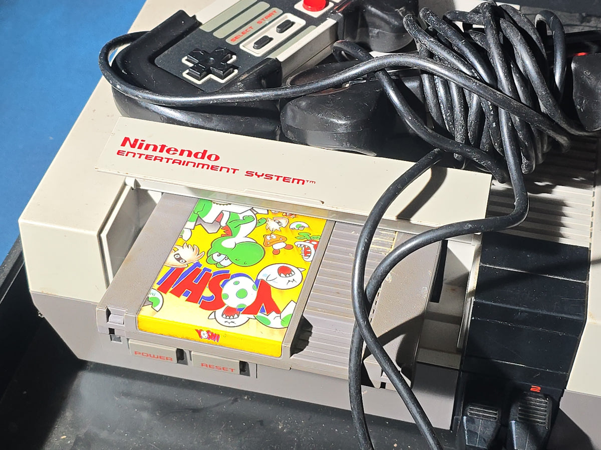 Vintage Nintendo Entertainment System NES-001 Console with Two Controllers, 15 Game Cartridges, NES Cleaning Kit, and Carrying Case
