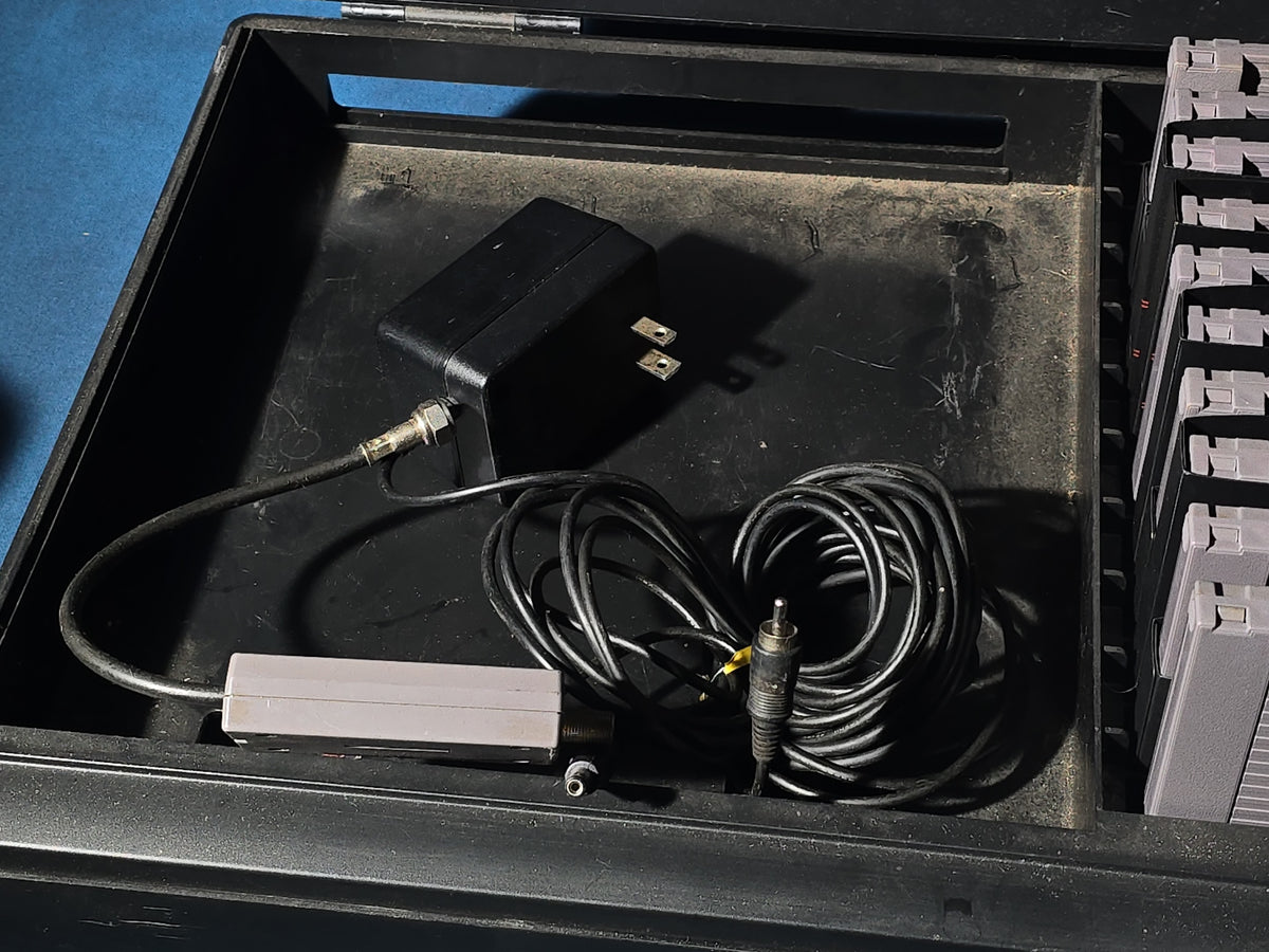 Vintage Nintendo Entertainment System NES-001 Console with Two Controllers, 15 Game Cartridges, NES Cleaning Kit, and Carrying Case
