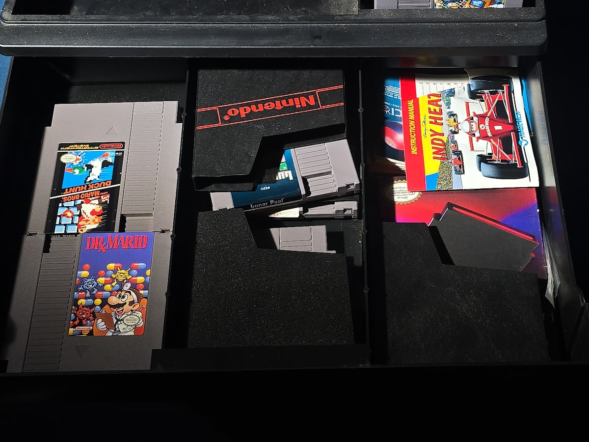 Vintage Nintendo Entertainment System NES-001 Console with Two Controllers, 15 Game Cartridges, NES Cleaning Kit, and Carrying Case