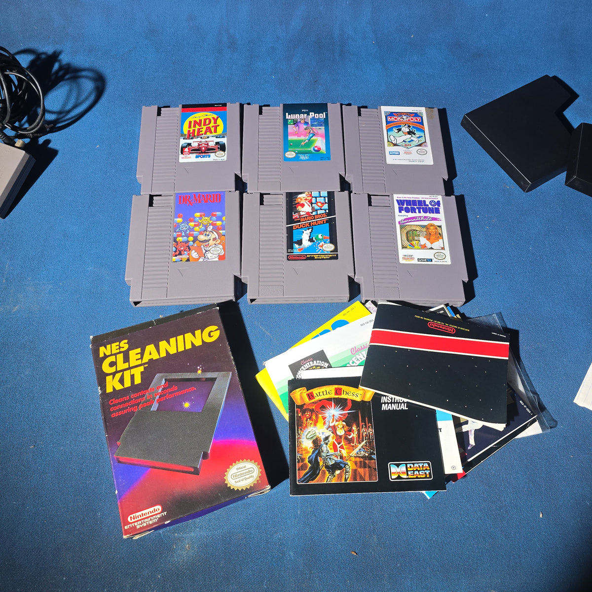 Vintage Nintendo Entertainment System NES-001 Console with Two Controllers, 15 Game Cartridges, NES Cleaning Kit, and Carrying Case