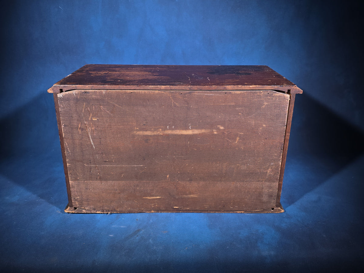 Antique Six-Drawer Spool Cabinet with Stenciled "Geneva" Lettering