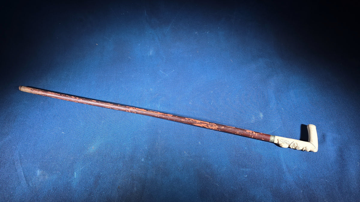 Antique Walking Cane with Carved Ivory Handle and Metal Collar