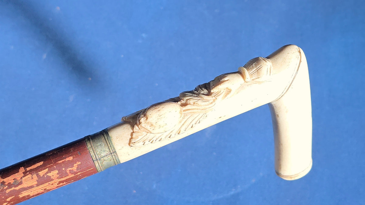 Antique Walking Cane with Carved Ivory Handle and Metal Collar