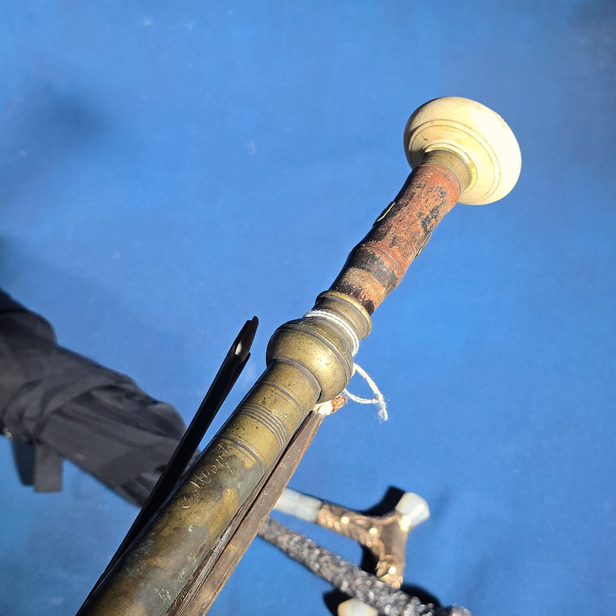 Grouping of Four Antique Parasols and Umbrellas with Ornate Handles including Mother of Pearl, 800 Silver, and Sterling Silver Examples