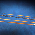 Lot 066 - Grouping of Four Antique Walking Canes Including Knotted Wood with Monogrammed Sterling Silver Knob, Bamboo with Glass-Topped Compass Handle, and Bone-Topped Wooden Cane