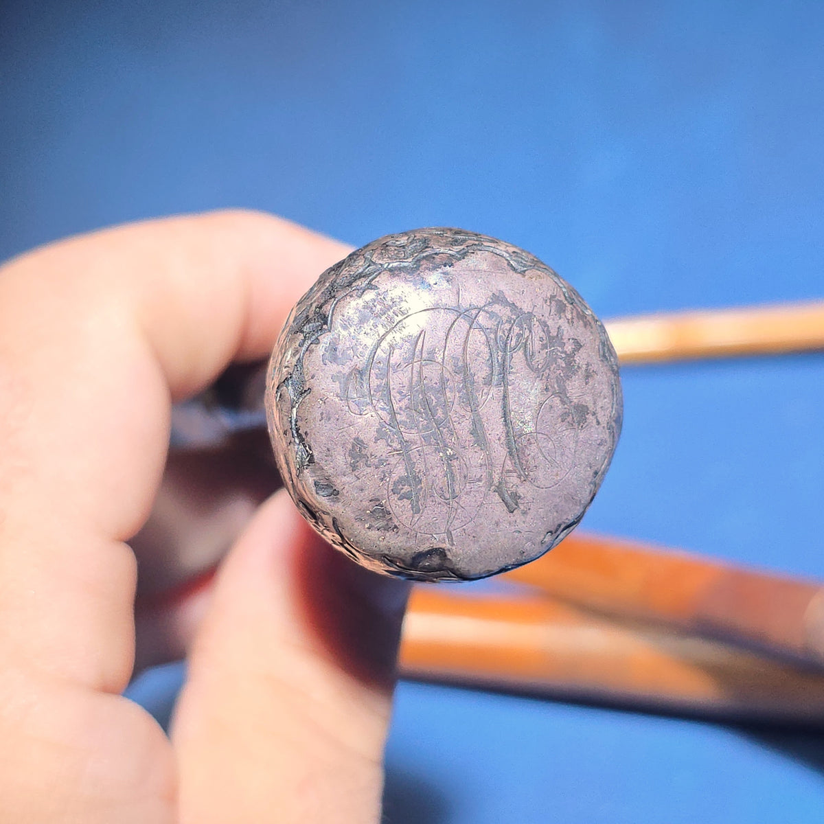 Grouping of Four Antique Walking Canes including Knotted Wood with Monogrammed Sterling Silver Knob, Bamboo with Glass-Topped Compass Handle, and Bone-Topped Wooden Cane