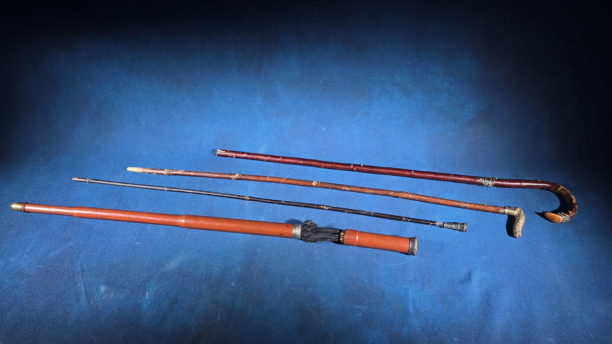 Grouping of Four Antique Walking Canes and Parasol Cane with Metal Handles