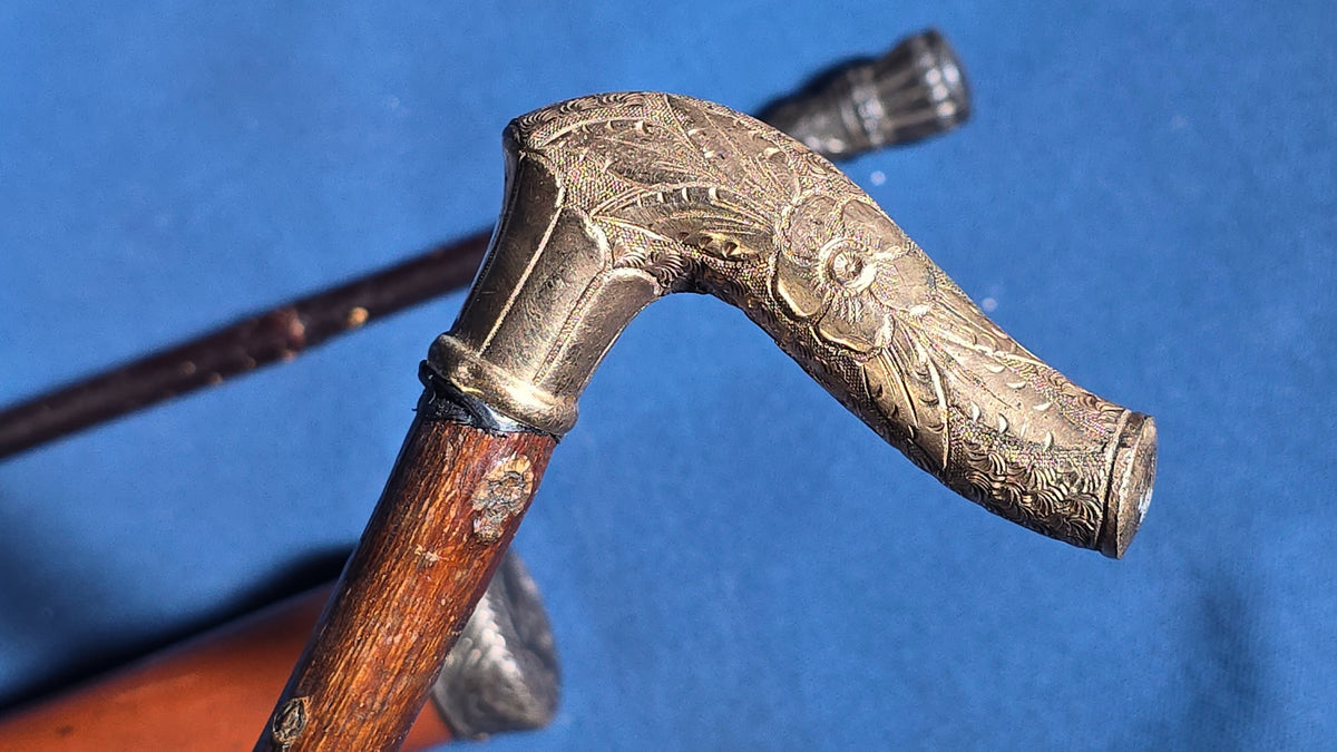 Grouping of Four Antique Walking Canes and Parasol Cane with Metal Handles