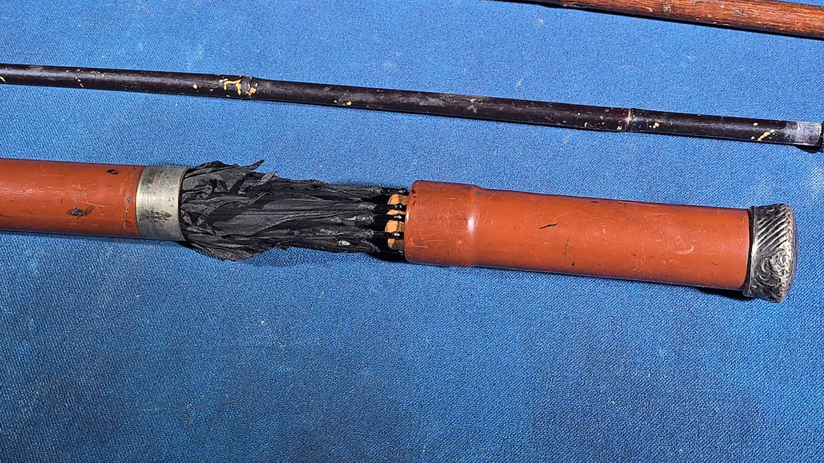 Grouping of Four Antique Walking Canes and Parasol Cane with Metal Handles