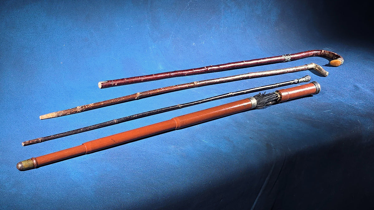 Grouping of Four Antique Walking Canes and Parasol Cane with Metal Handles