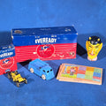 Lot 176 - Grouping of Vintage Smalls Including Eveready Nine Lives Batteries, Cast Metal Toy Cars, Carved Wooden Devil Head, and Postcards