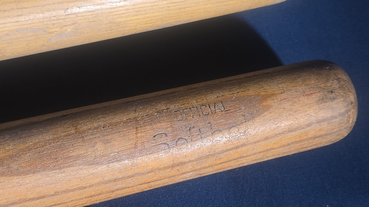 Grouping of Five Vintage Wood Softball Bats including Louisville Slugger and Official Lightning