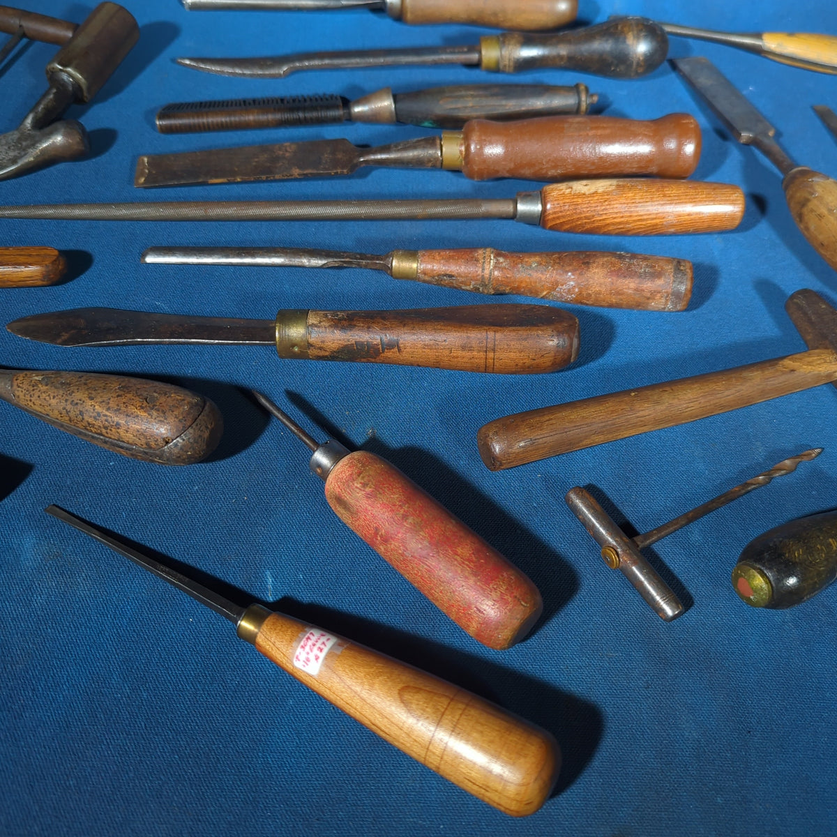 Grouping of Antique and Vintage Wood-Handled Hand Tools including Chisels, Screwdrivers, Awls, Files, and a Tack Hammer