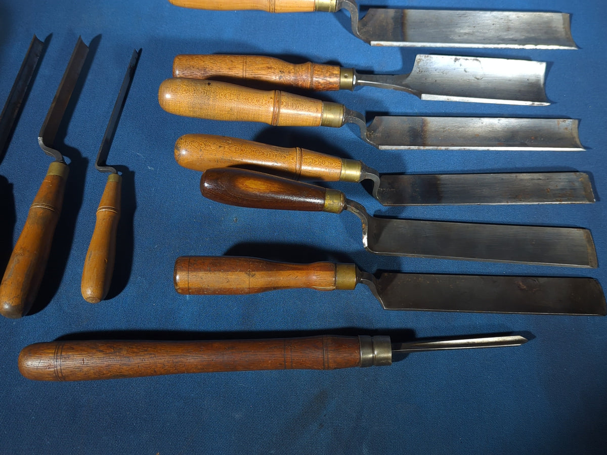 Grouping of 11 Antique Wood Chisels and Gouges with Wood Handles including Buck Brothers Cast Steel and Moulson Brothers Sheffield