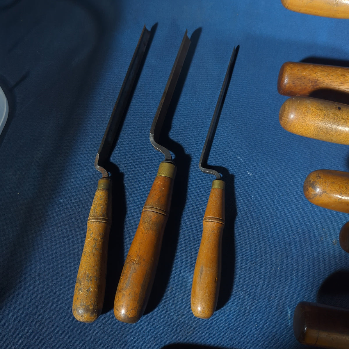 Grouping of 11 Antique Wood Chisels and Gouges with Wood Handles including Buck Brothers Cast Steel and Moulson Brothers Sheffield