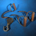 Lot 128 - Grouping of Four Antique Iron Hooks Including Three Hay/Ice Hooks with Wood Handles and One Pulley Hook