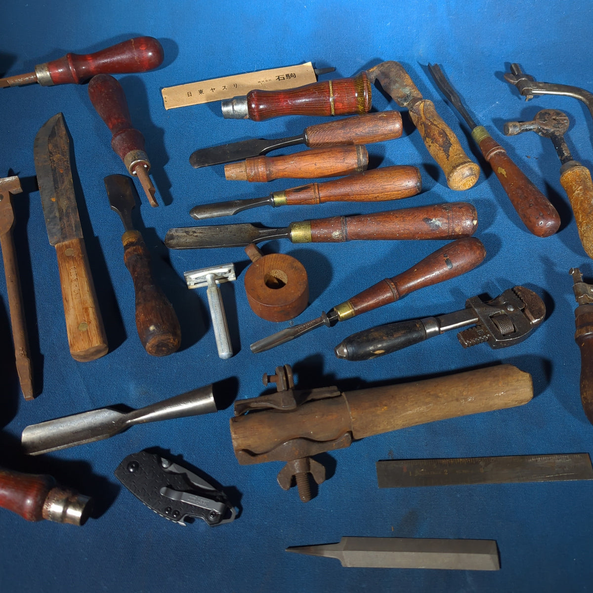 Grouping of Antique and Vintage Wood-Handled Hand Tools including Chisels, Screwdrivers, Hacksaws, Files, Wrenches, and Knives