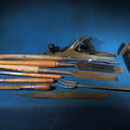 Lot 123 - Grouping of Antique and Vintage Hand Tools Including Stanley No. 6 Wood Plane, Chisels, Hay Gaff, File, and Twisted Iron Implements