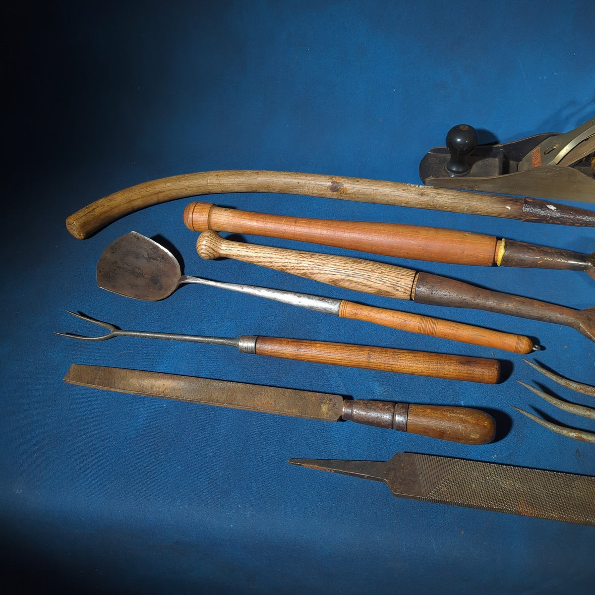 Grouping of Antique and Vintage Hand Tools including Stanley No. 6 Wood Plane, Chisels, Hay Gaff, File, and Twisted Iron Implements