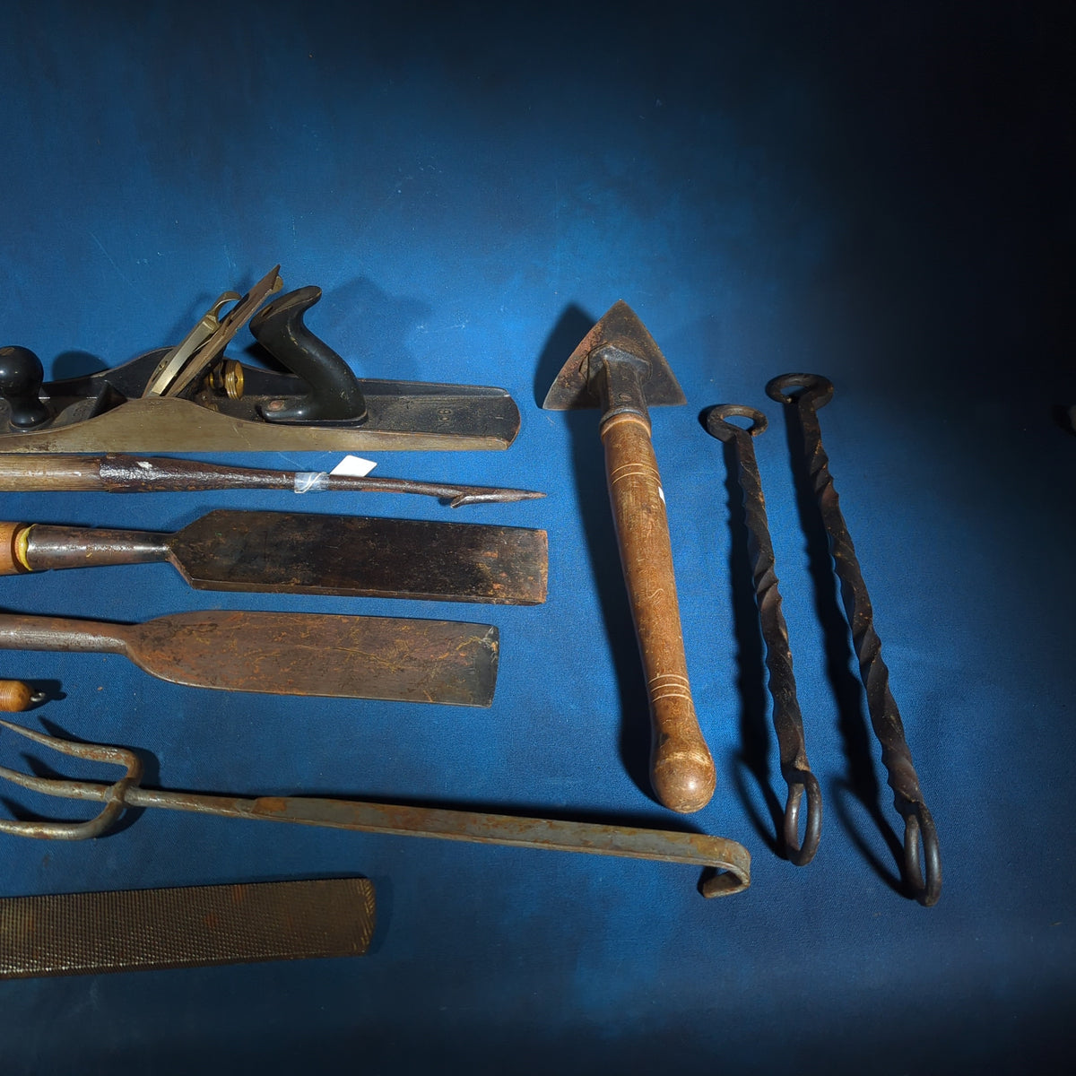 Grouping of Antique and Vintage Hand Tools including Stanley No. 6 Wood Plane, Chisels, Hay Gaff, File, and Twisted Iron Implements