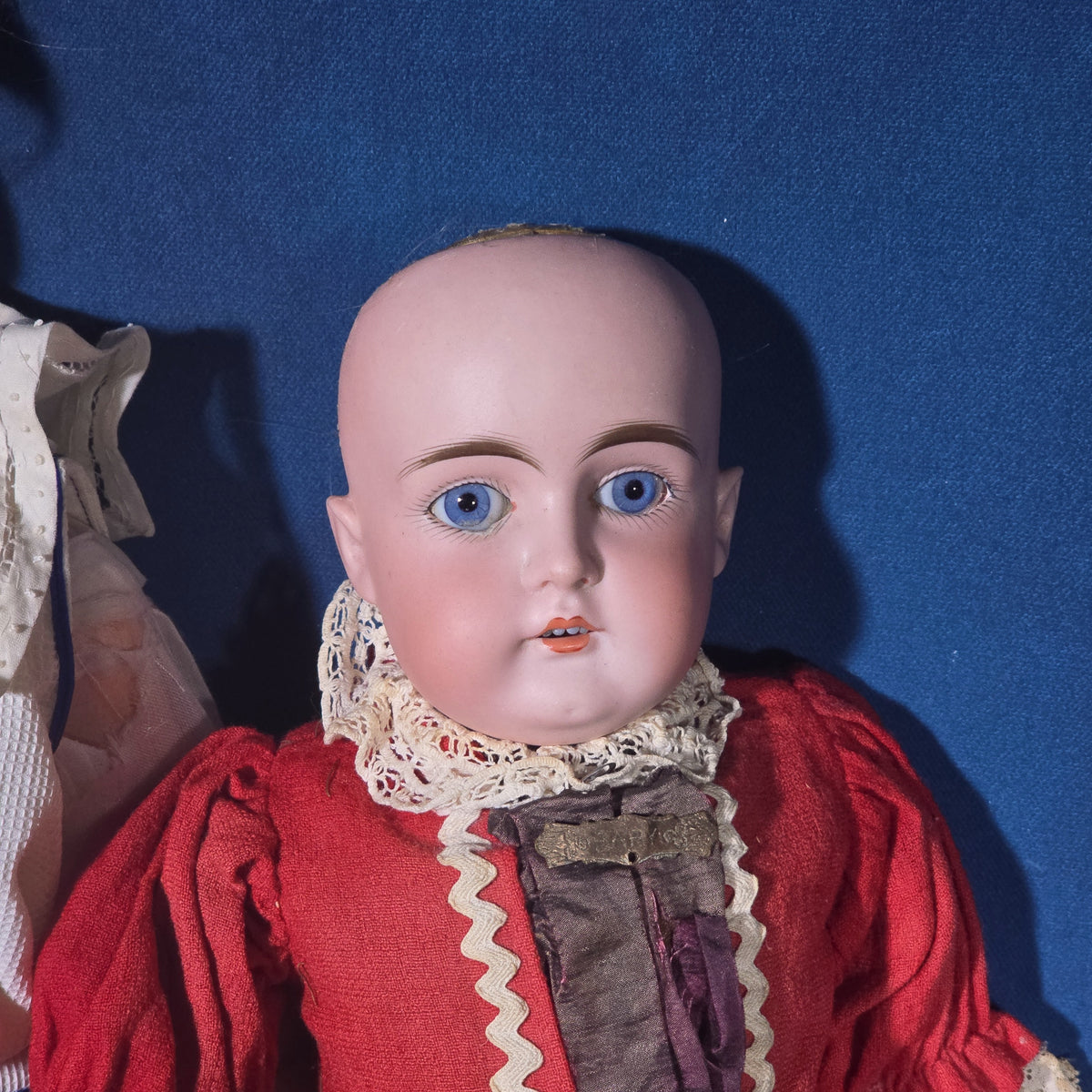 Grouping of Four Antique German Bisque Head and China Head Dolls