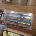 Lot 039 - Plastic Display Case with Trains