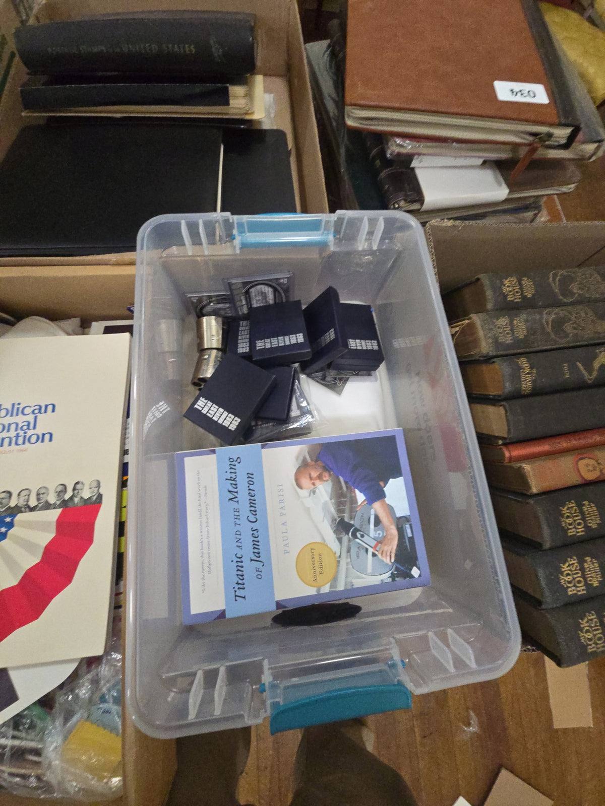 grouping of miscellaneous Collectibles including Titanic books and pieces of the East River Bridge