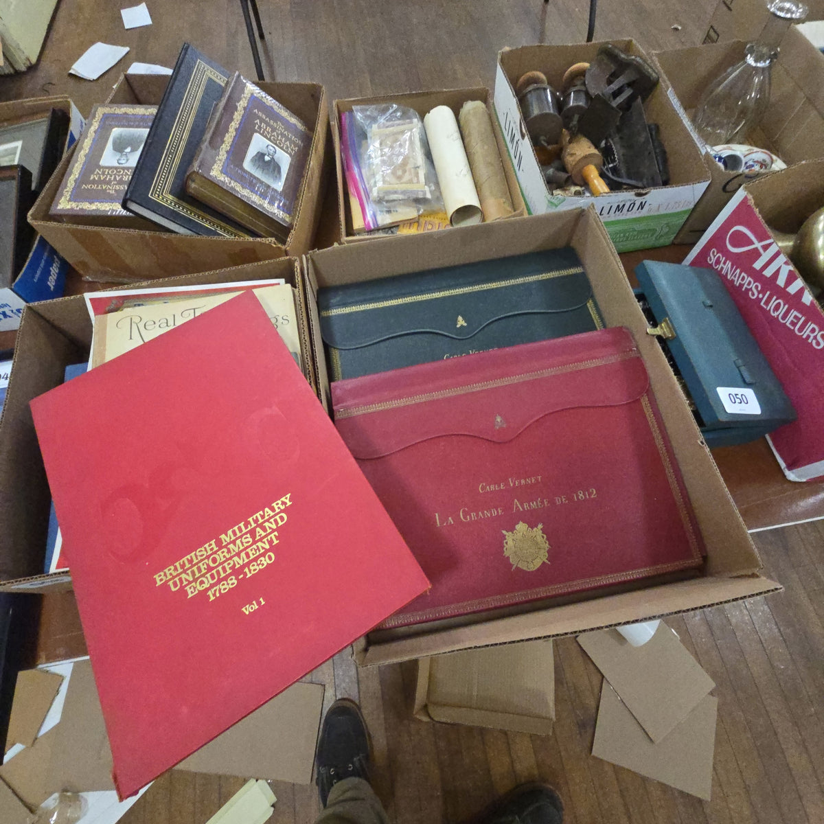 grouping of military related books including the Grand Army of 1812 folio Editions