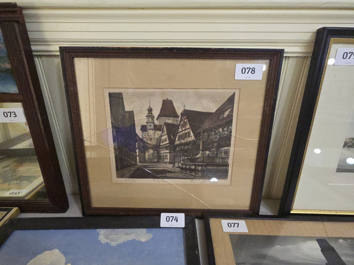 framed print of European scene, signed and titled, with broken glass