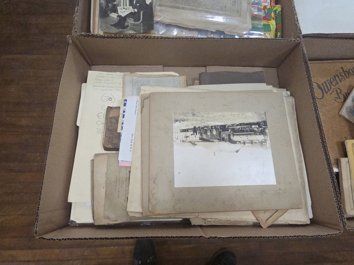 box lot of ephemera including boarded photos of trains, books, A Treatise on the horse, and more