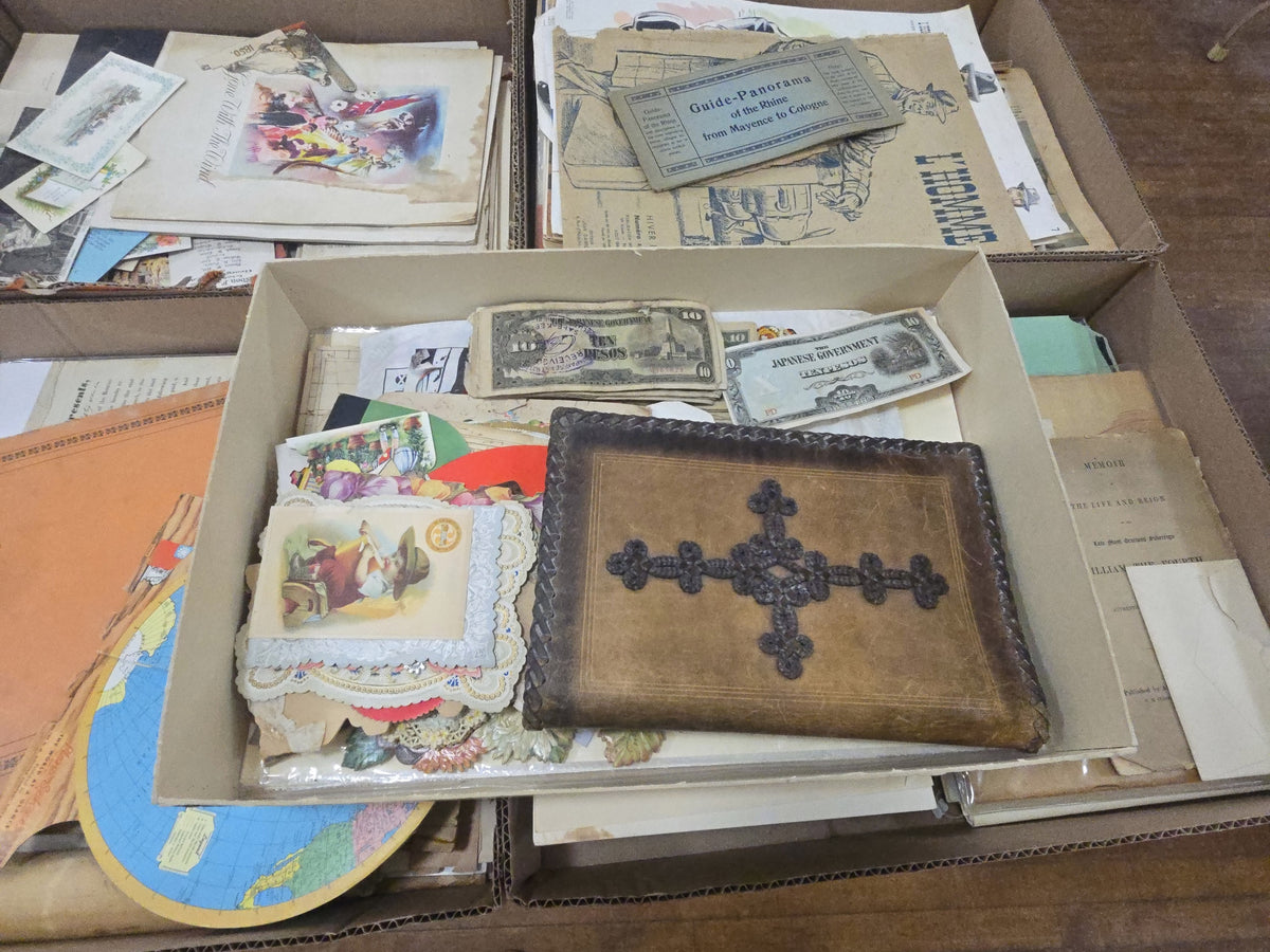 box lot of ephemera including leather book cover, Japanese pesos, and many Valentines