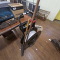 Lot 137 - Reel of Box Strapping with Two Garden Tools