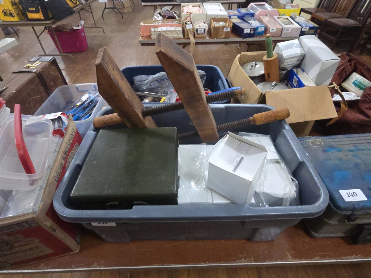 binalat with New Old Stock boxes of string, metal toolbox, and wooden clamp