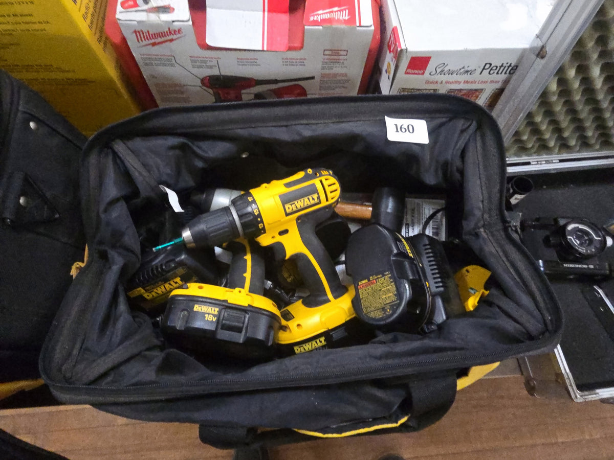 DeWalt tool bag with DeWalt drill, impact driver, and DeWalt batteries with chargers