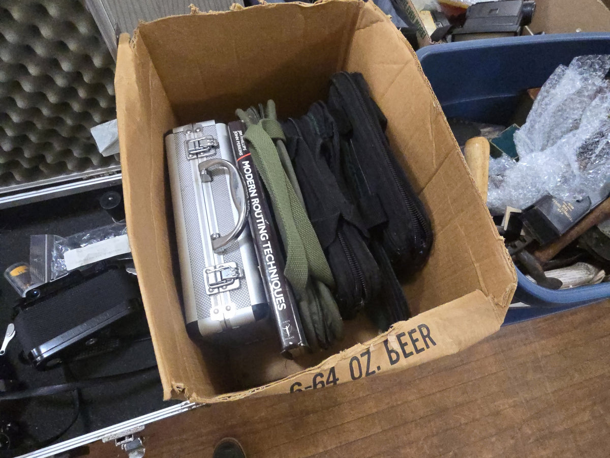 box lot with hard and soft gun cases and routing book