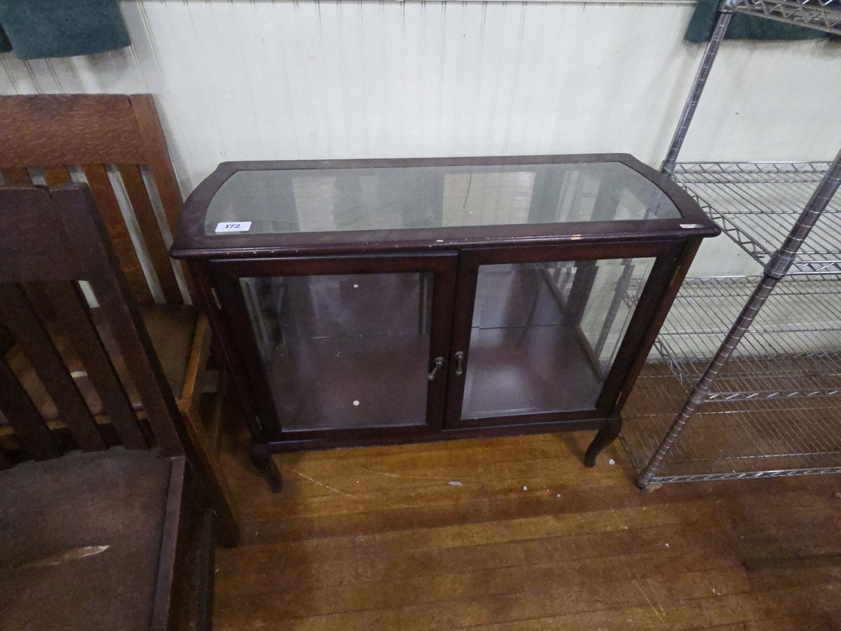 modern mirrored cabinet with glass doors, sides, and top
