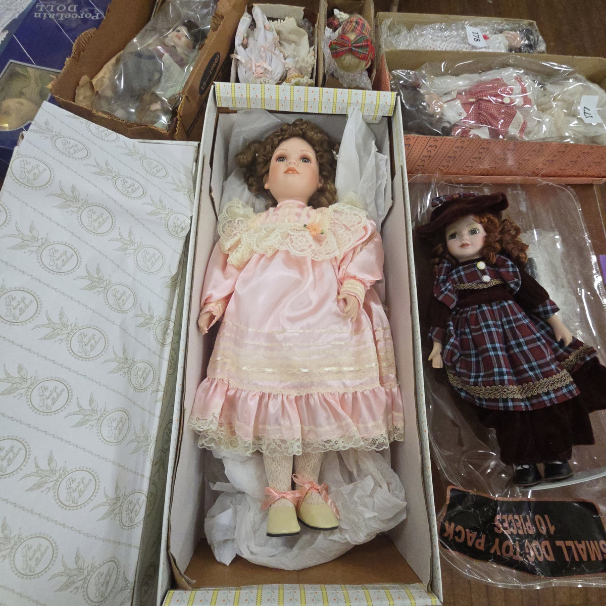 tall porcelain doll in box