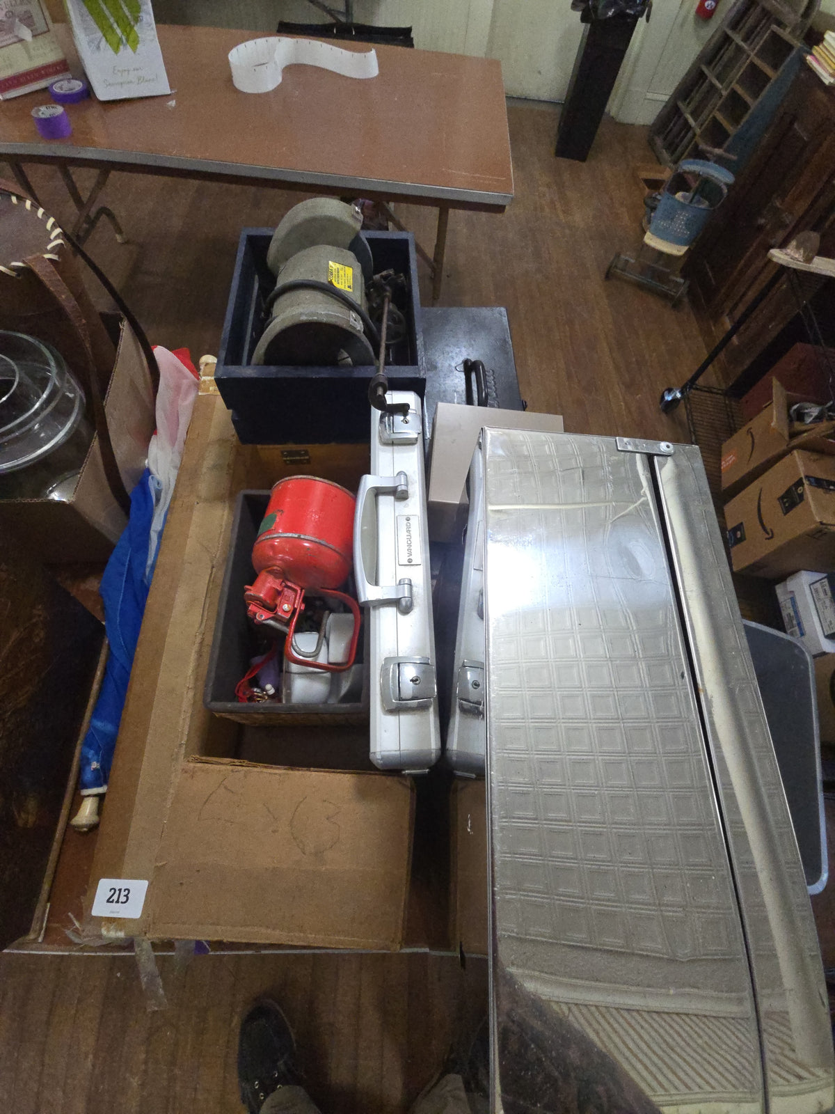 and lot grouping of miscellaneous including metal boxes, electric spray paint gun, grinder, and more