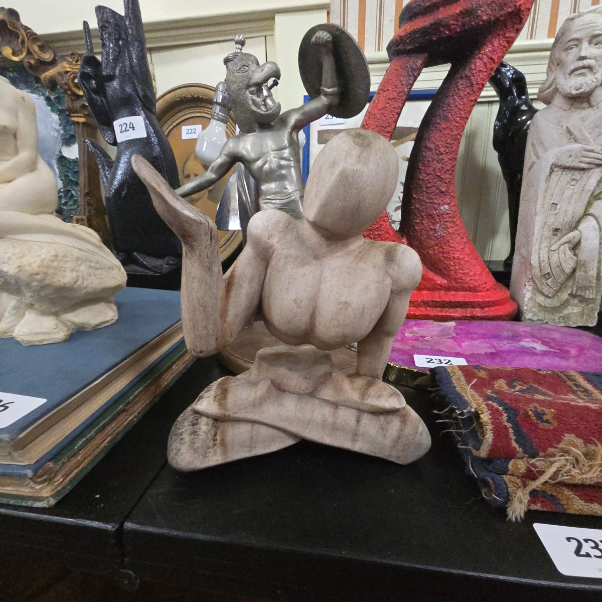 wooden illusion statue