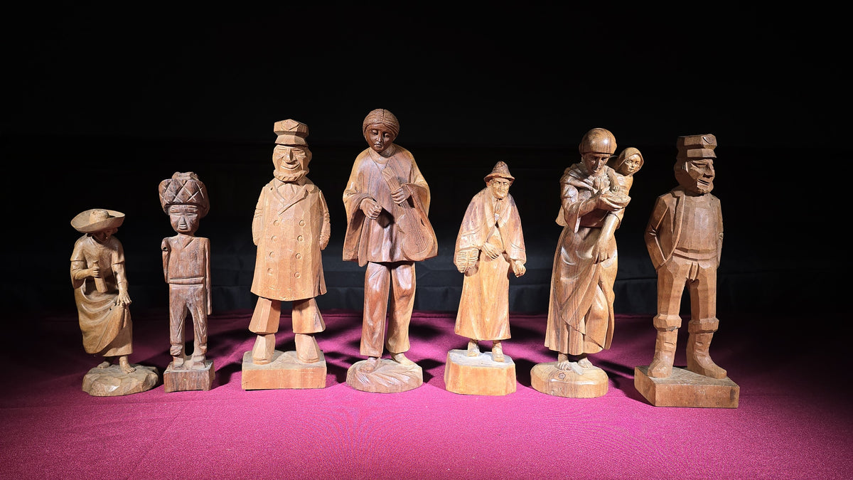 Grouping of Seven Vintage Hand-Carved Wood Figures