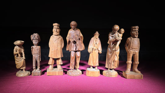 Grouping of Seven Vintage Hand-Carved Wood Figures