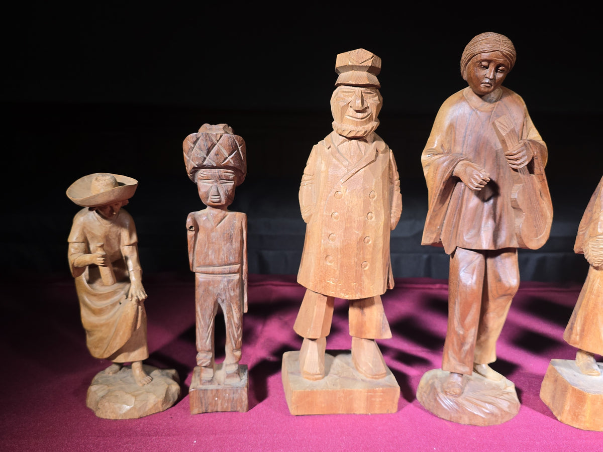 Grouping of Seven Vintage Hand-Carved Wood Figures