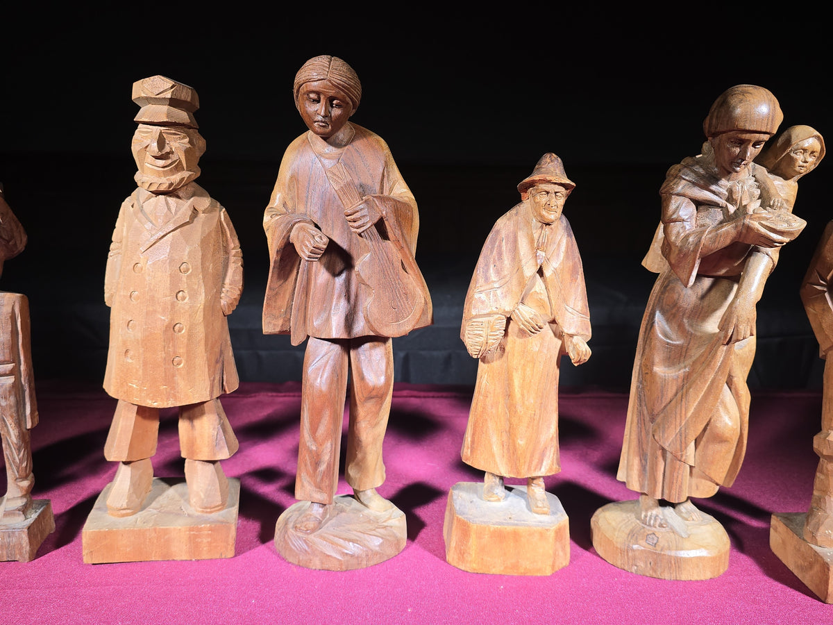 Grouping of Seven Vintage Hand-Carved Wood Figures